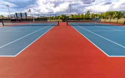 Comment choisir le type de clôture le mieux adapté pour un court de tennis à Grenoble ?