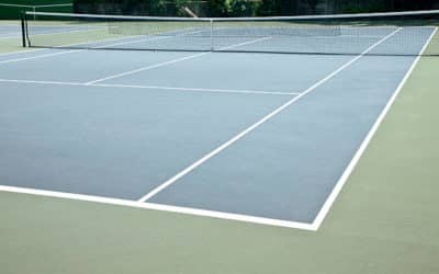 Construction court de tennis à Grenoble: Quelles sont les exigences en matière de sécurité pour les espaces de jeu adjacents aux courts de tennis à Grenoble ?