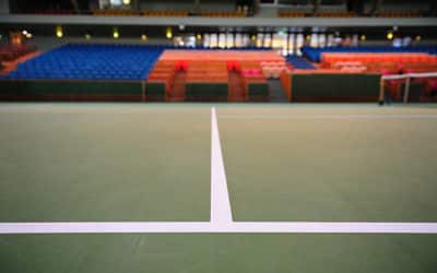 Comment le constructeur de courts de tennis à Nice pour les camps de vacances peut-il minimiser l’impact environnemental des constructions ?