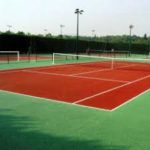 construction d'un court de tennis en gazon synthétique