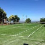 construction d'un court de tennis en gazon synthétique