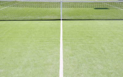 Comment choisir le meilleur emplacement pour la construction d&rsquo;un court de tennis en gazon synthétique en vue d&rsquo;une tournée?