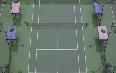 Quels sont les bénéfices du revêtement en béton poreux pour la rénovation d’un court de tennis à Massy ?
