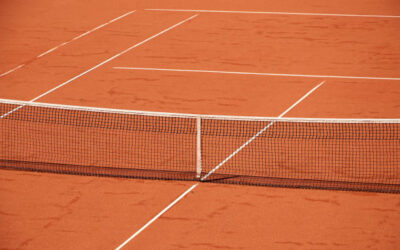Quels sont les avantages de la terre battue pour la rénovation de courts de tennis à Saint-Genis-Laval ?