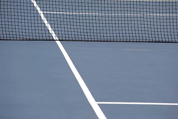 Entretien court de tennis en béton poreux lyon