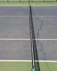 Court de tennis en béton poreux à Paris : une surface fiable et facile à gérer au quotidien