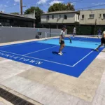 Terrain de pickleball bleu "PICKLETOWN". Construction court de tennis la Reunion.